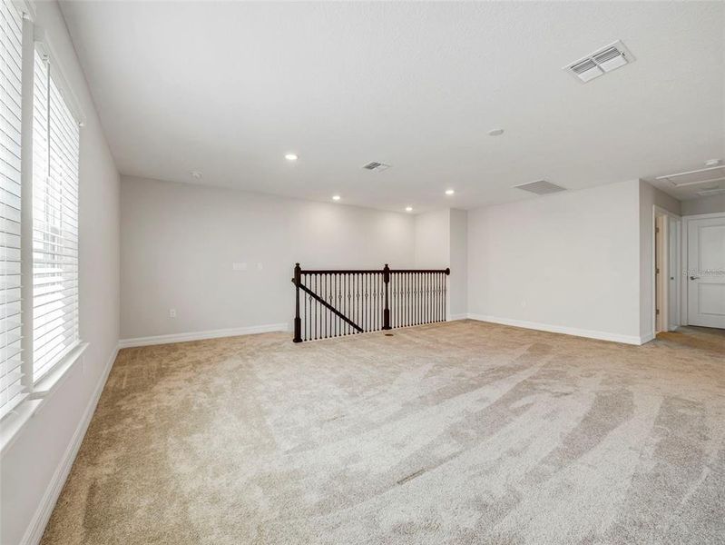 Spacious, unfurnished interior of a new home in Willow Ridge, Montverde (Image 31).