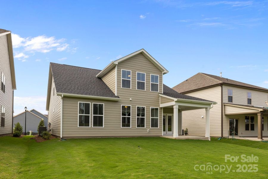 Front exterior of a new home in Lakeside Glen, York, SC, highlighting curb appeal (Image 25). Front exterior of a new home in Lakeside Glen, York, SC, highlighting curb appeal (Image 25).