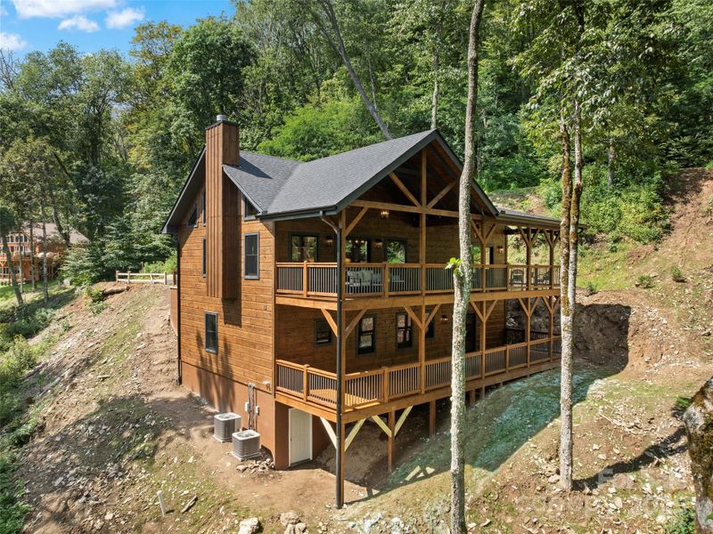 Front exterior of a new home in , Maggie Valley, NC, highlighting curb appeal (Image 25).