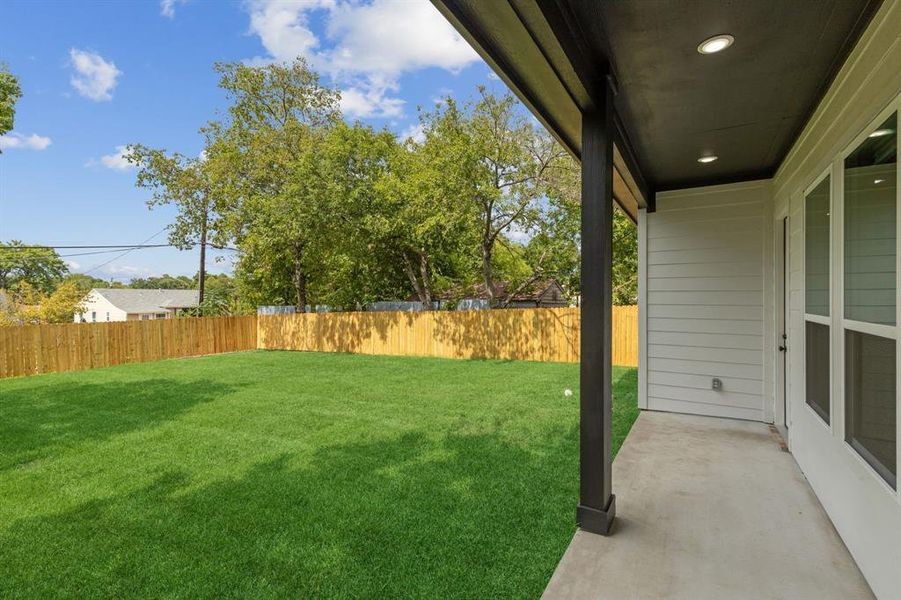 View of yard with a patio area