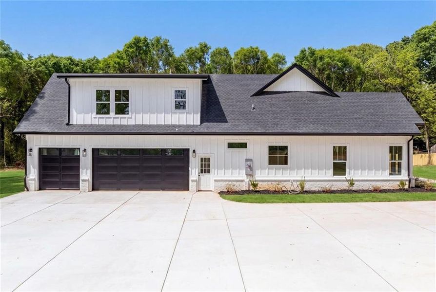 Front exterior of a new home in , Monroe, GA, highlighting curb appeal (Image 31).