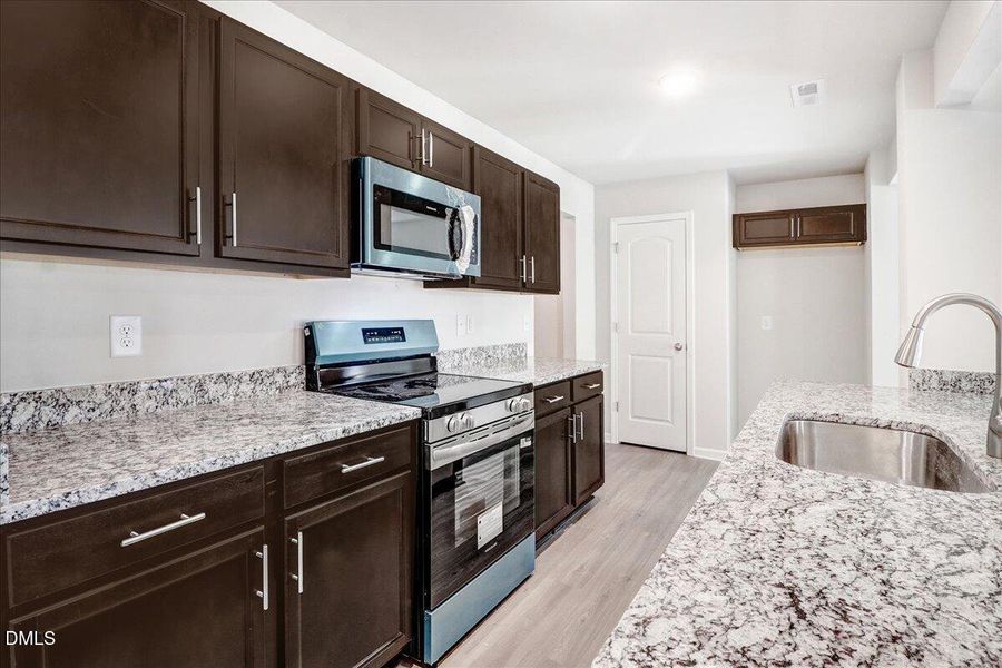 23-Kitchen with stainless steel range an