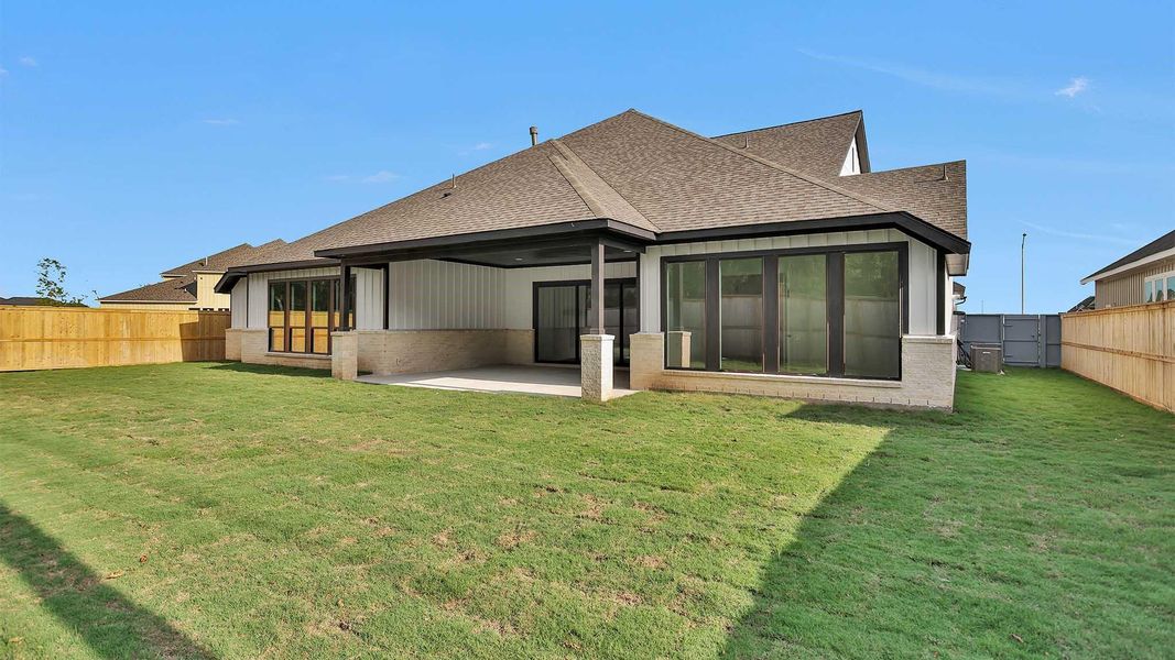 Exterior details and patio area of a home in Fulshear Lakes 80', Fulshear (Image 3).