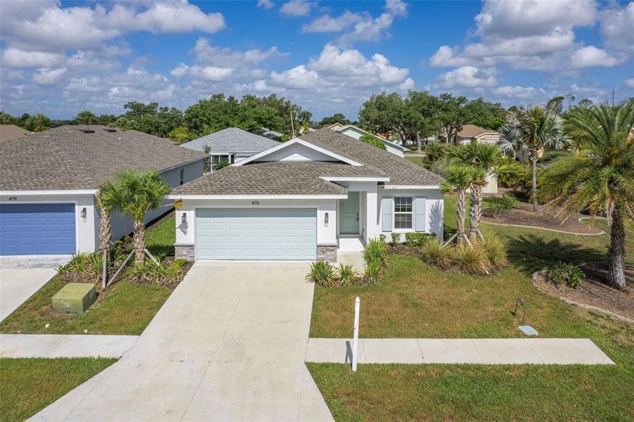 Front exterior of a new home in , Port Charlotte, FL, highlighting curb appeal (Image 1). Front exterior of a new home in , Port Charlotte, FL, highlighting curb appeal (Image 1).