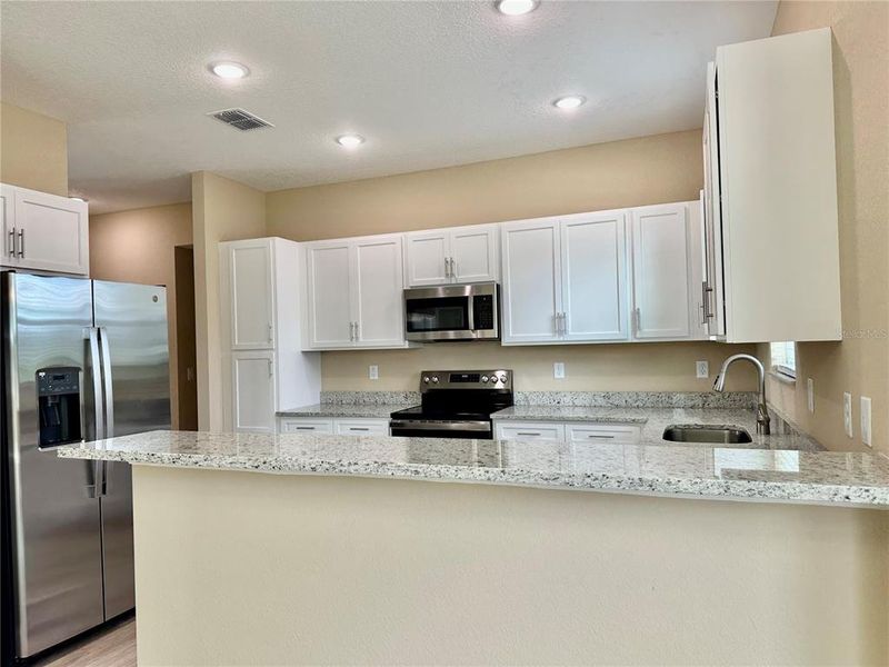 Furnished interior view inside a new home in , Weeki Wachee (Image 37).