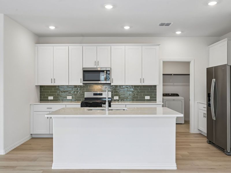 Furnished interior view inside a new home in Parks at Foster Crossing - Spring Series, Anna (Image 6).