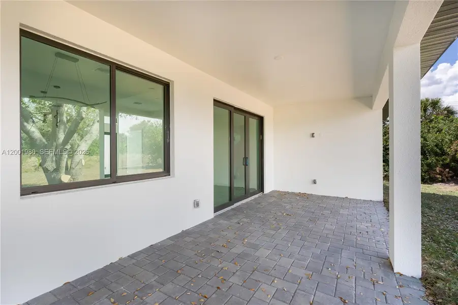 Exterior details and patio area of a home in , Lehigh Acres (Image 21).