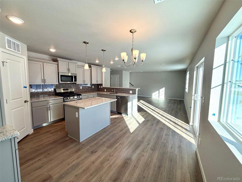 Furnished interior view inside a new home in , Watkins (Image 3). Furnished interior view inside a new home in , Watkins (Image 3).