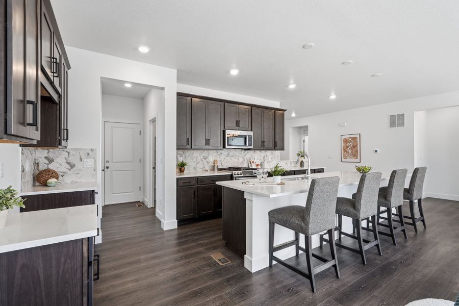Furnished interior view inside a new home in Trailstone, Arvada (Image 10).
