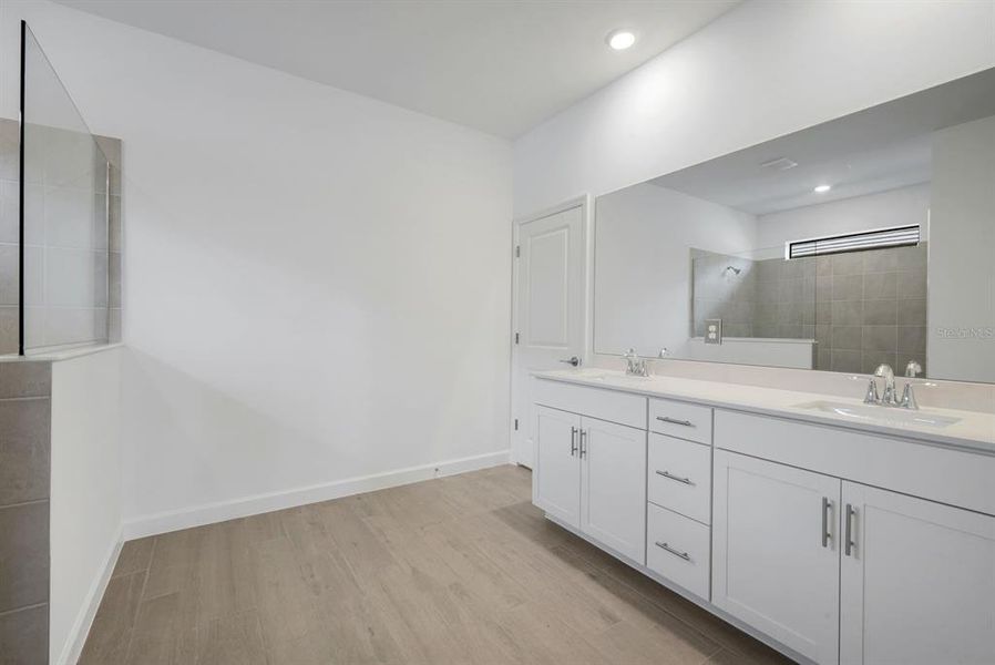 Furnished interior view inside a new home in Verdana Village, Estero (Image 8).