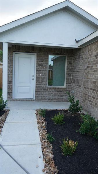 Exterior details and patio area of a home in Flagstone, Humble (Image 3).