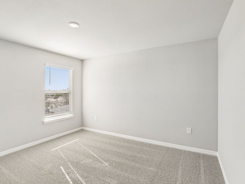 Spacious, unfurnished interior of a new home in Crescent Lakes - Premier Series, Punta Gorda (Image 20).