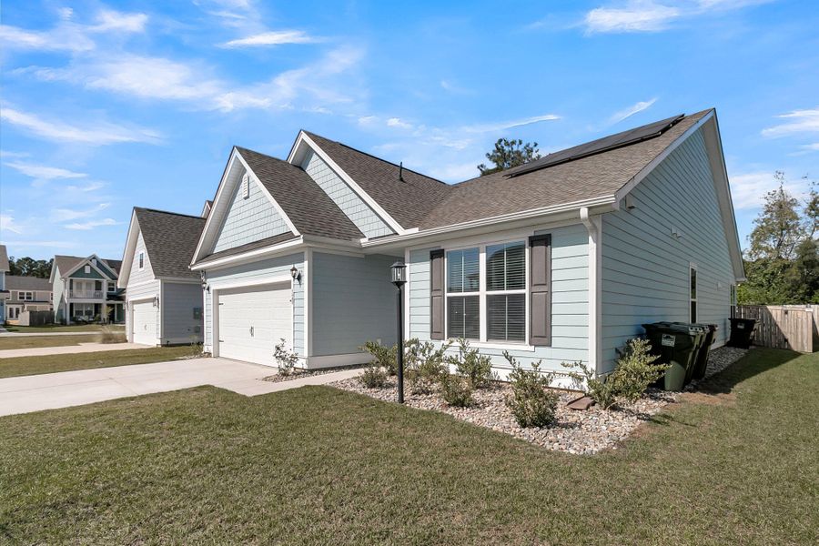 Front exterior of a new home in Abbey Walk, Moncks Corner, SC, highlighting curb appeal (Image 25).