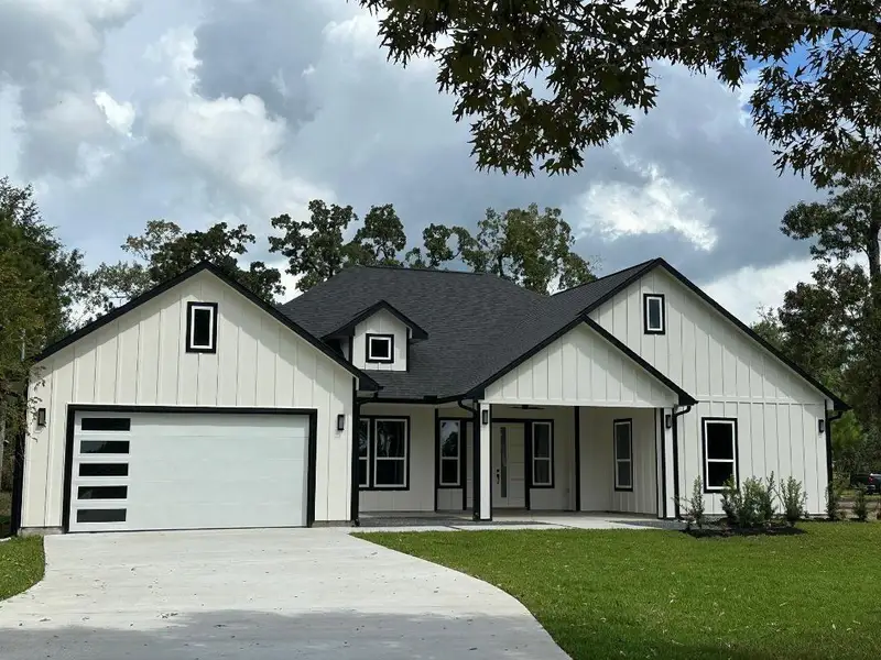 Front exterior of a new home in , Plantersville, TX, highlighting curb appeal (Image 1). Front exterior of a new home in , Plantersville, TX, highlighting curb appeal (Image 1).