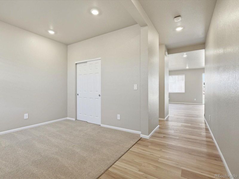Spacious, unfurnished interior of a new home in Buffalo Highlands: The Flora Collection, Commerce City (Image 16).