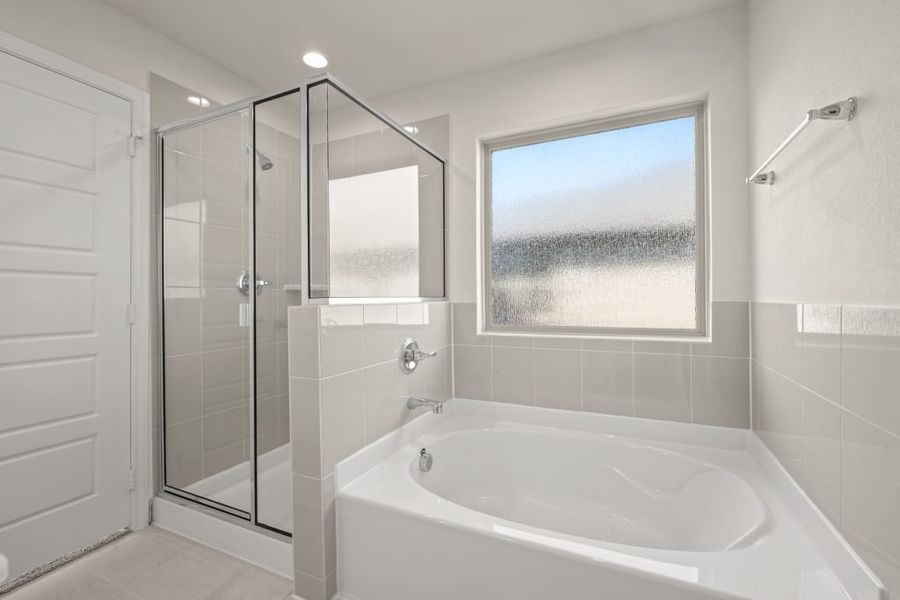 Front exterior of a new home in Myrtle Creek, Waxahachie, TX, highlighting curb appeal (Image 23). Front exterior of a new home in Myrtle Creek, Waxahachie, TX, highlighting curb appeal (Image 23).