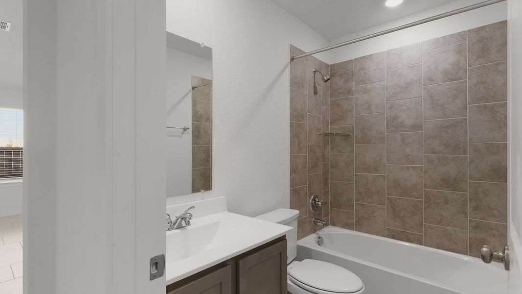 Furnished interior view inside a new home in Briarwood, Elgin (Image 9).