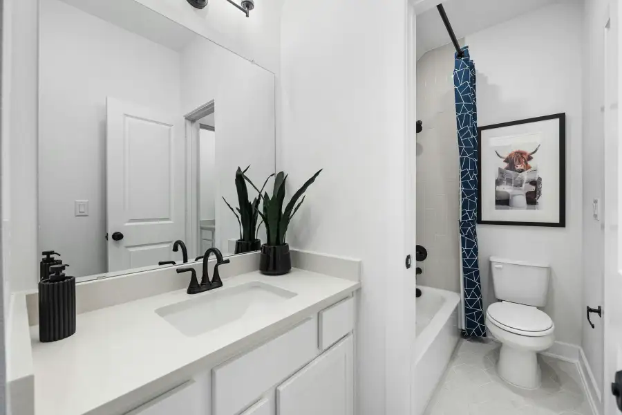 Furnished interior view inside a new home in Wolf Ranch, Georgetown (Image 27).
