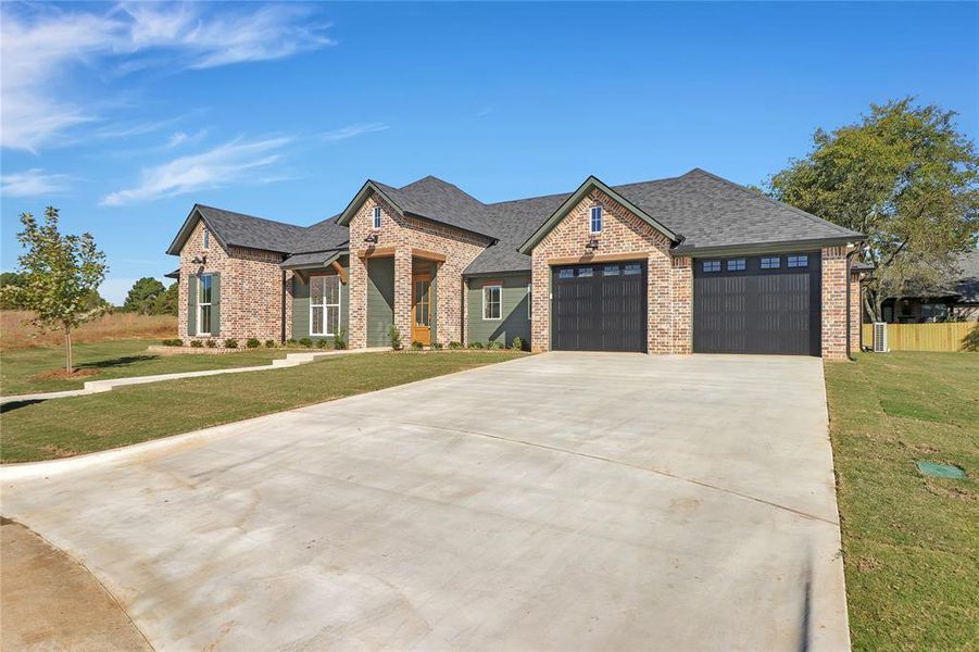 Front exterior of a new home in , Flint, TX, highlighting curb appeal (Image 2).