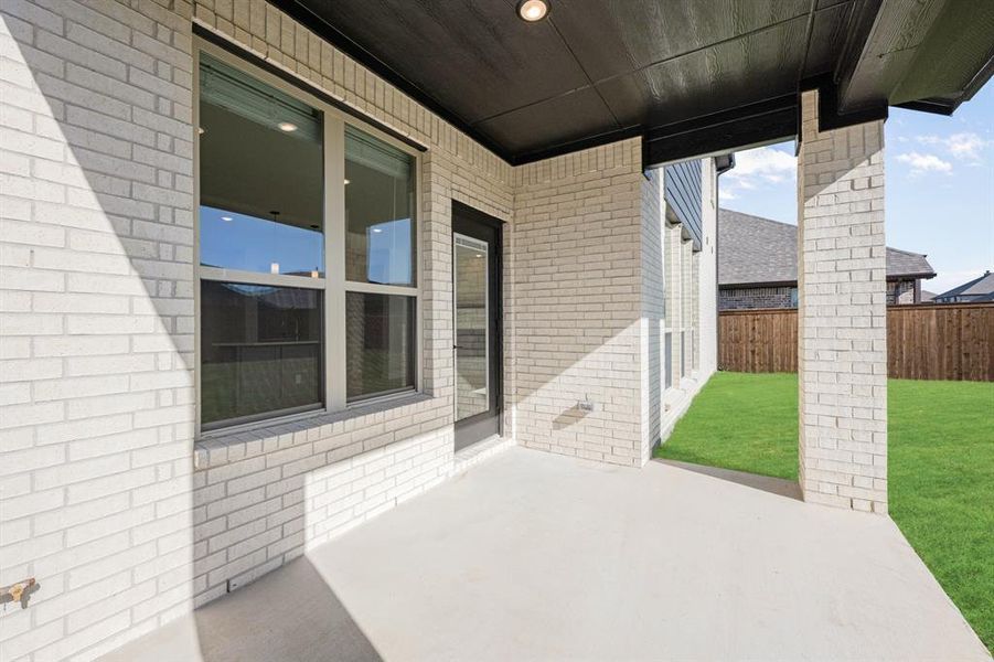 Exterior details and patio area of a home in Silo Mills, Joshua (Image 4).