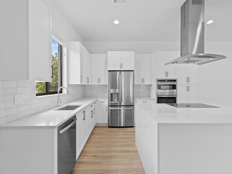 Representative furnished interior of a home built from the The Mainsail by 13th Floor Homes in Marina Landings, Fort Lauderdale (Image 13).