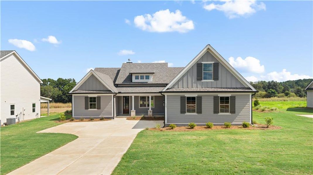 Front exterior of a new home in , Madison, GA, highlighting curb appeal (Image 27). Front exterior of a new home in , Madison, GA, highlighting curb appeal (Image 27).