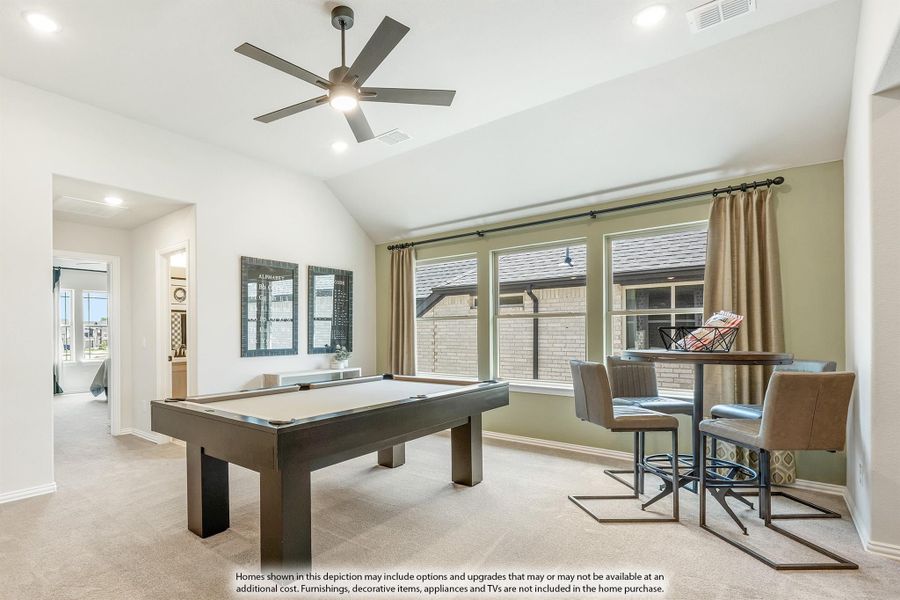 Game room with pool table, vaulted ceiling, ceiling fan, and bar-height table with chairs