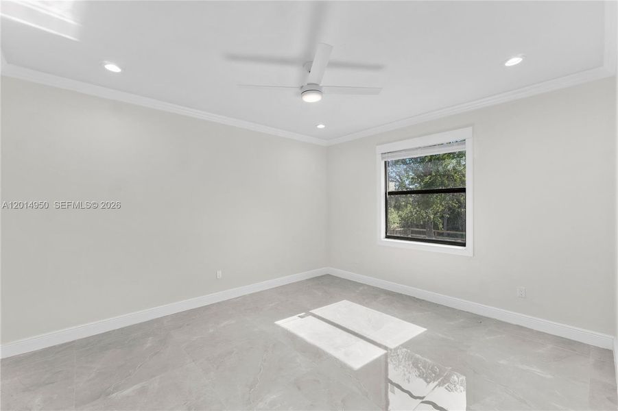 Primary bedroom with natural light