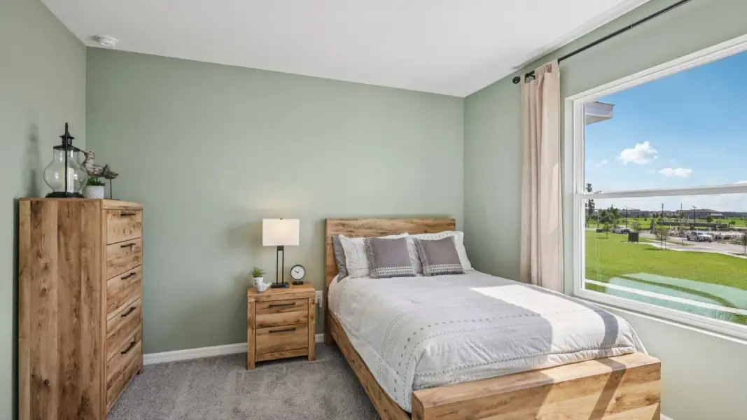 Furnished interior view inside a new home in Towns at Woodsdale, Wesley Chapel (Image 28).