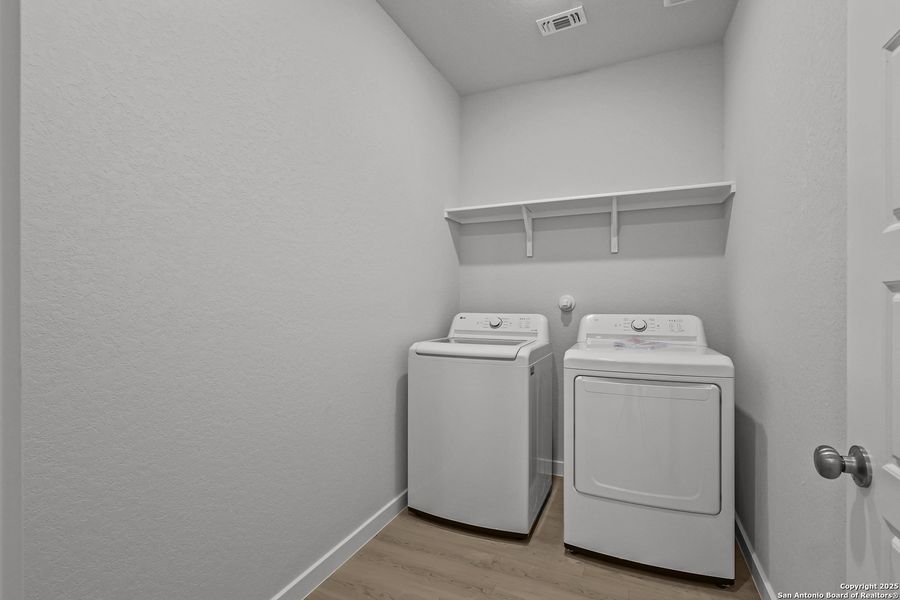 Furnished interior view inside a new home in Cinco Lakes, San Antonio (Image 14).