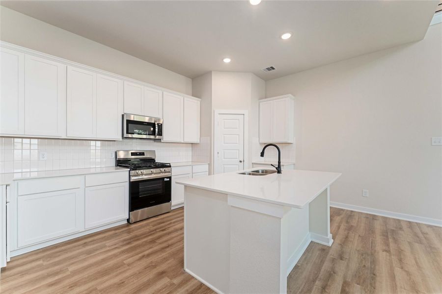 Furnished interior view inside a new home in Lexington Heights, Willis (Image 6).