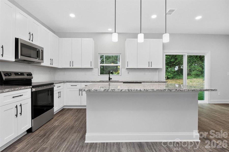 Furnished interior view inside a new home in , Belmont (Image 14).