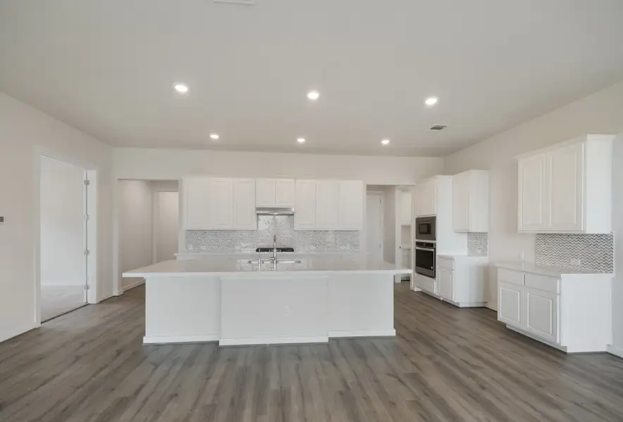 Representative furnished interior of a home built from the Englewood by Scott Felder Homes in Prominence, San Antonio (Image 4).
