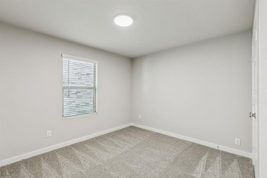 Bedroom in the Harper home plan by Trophy Signature Homes – REPRESENTATIVE PHOTO Bedroom in the Harper home plan by Trophy Signature Homes – REPRESENTATIVE PHOTO