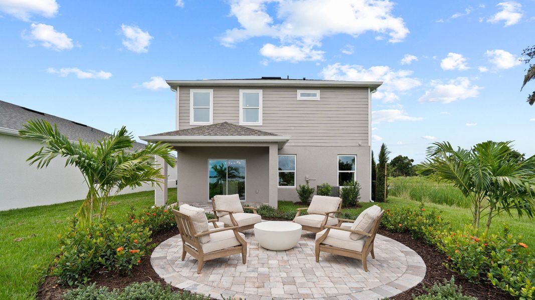 Representative exterior photo of a completed home built from the Ponte Verde by DRB Homes in Willowbrook North, Winter Haven, FL (Image 27). Representative exterior photo of a completed home built from the Ponte Verde by DRB Homes in Willowbrook North, Winter Haven, FL (Image 27).