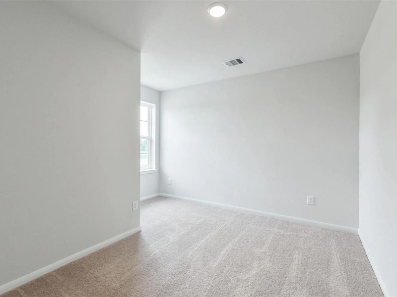 Spacious, unfurnished interior of a new home in Caney Creek Place, Conroe (Image 31).