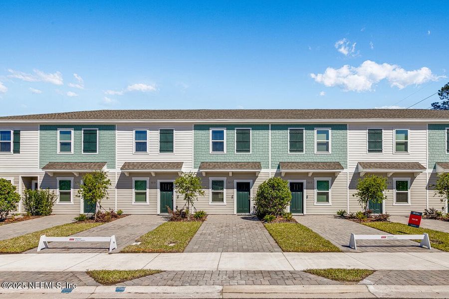 Front exterior of a new home in Sabal Terrace, Jacksonville, FL, highlighting curb appeal (Image 1). Front exterior of a new home in Sabal Terrace, Jacksonville, FL, highlighting curb appeal (Image 1).