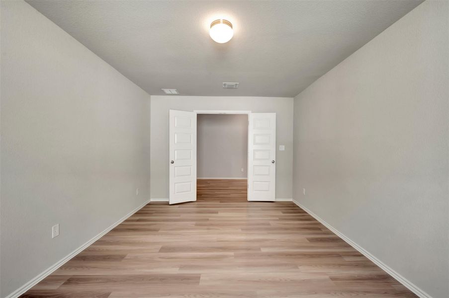Spacious, unfurnished interior of a new home in Carillon, Manor (Image 25).