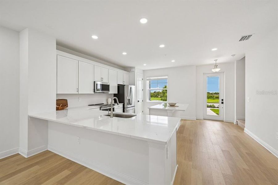 Furnished interior view inside a new home in Palmera at Wellen Park, Venice (Image 5).