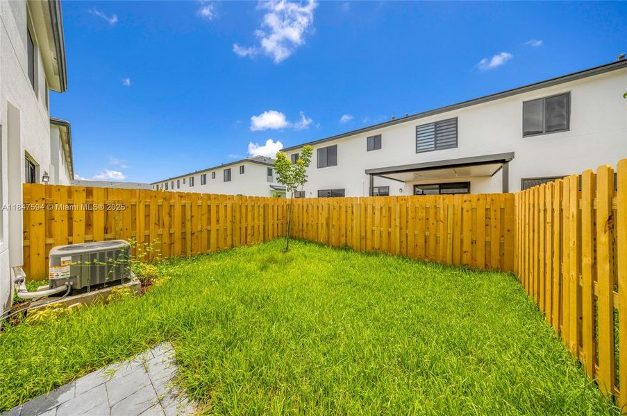 Front exterior of a new home in , Homestead, FL, highlighting curb appeal (Image 2).