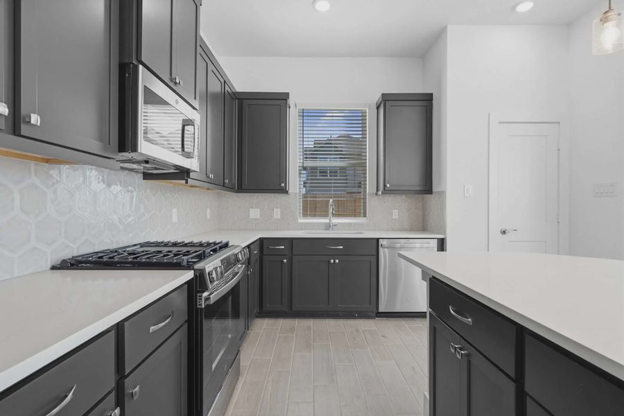 Representative furnished interior of a home built from the Chantilly 2 by Chesmar Homes in Sienna Chateau, Missouri City (Image 8).