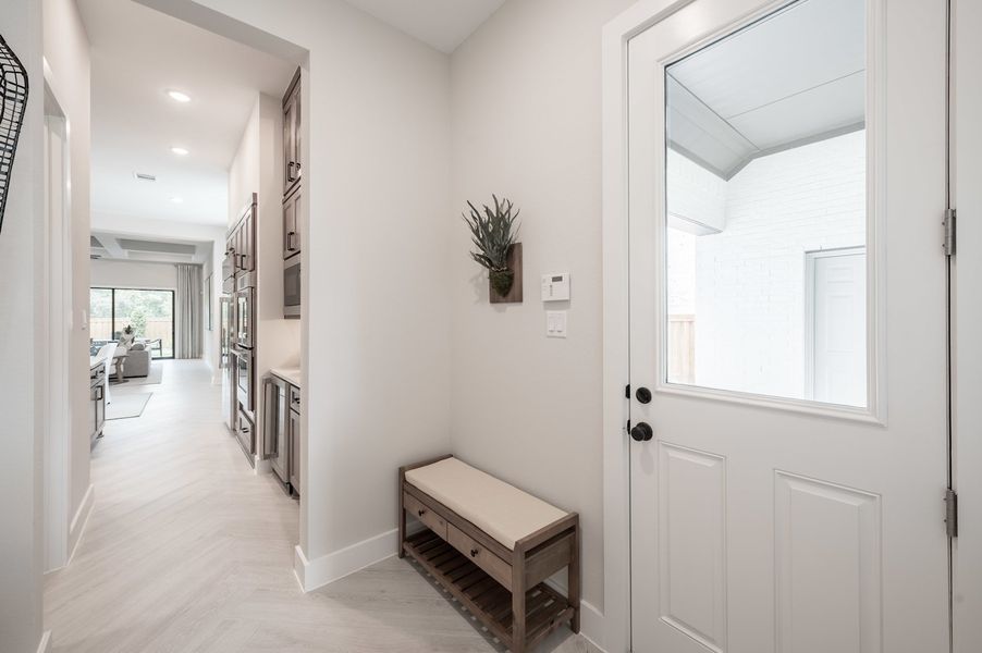 Representative furnished interior of a home built from the Carignan by Tri Pointe Homes in Woodson’s Reserve, Spring (Image 56).