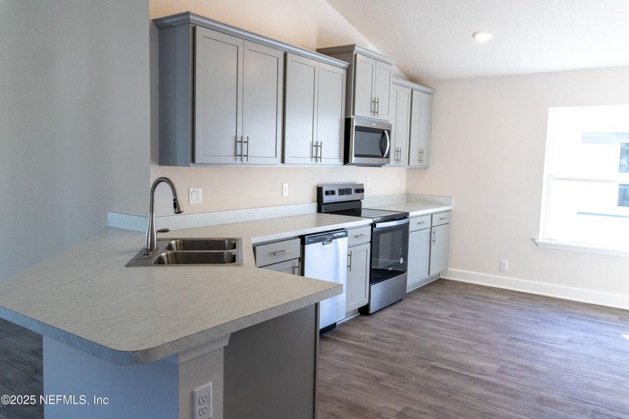 Furnished interior view inside a new home in Summerglen, Jacksonville (Image 4).