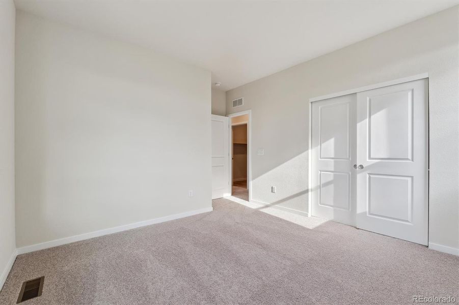 Spacious, unfurnished interior of a new home in Floret Collection at Parkdale Commons, Lafayette (Image 25).