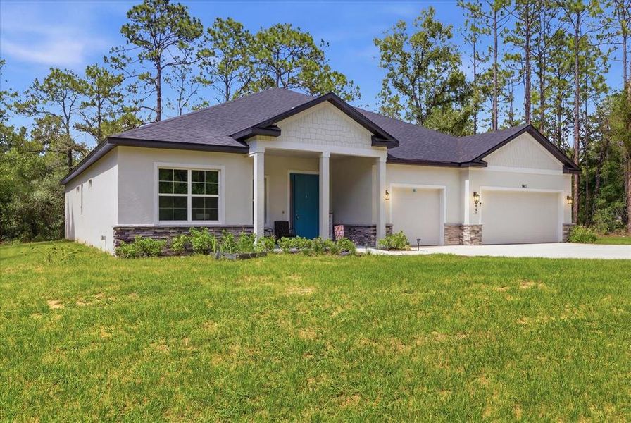 Front exterior of a new home in , Hernando, FL, highlighting curb appeal (Image 33). Front exterior of a new home in , Hernando, FL, highlighting curb appeal (Image 33).