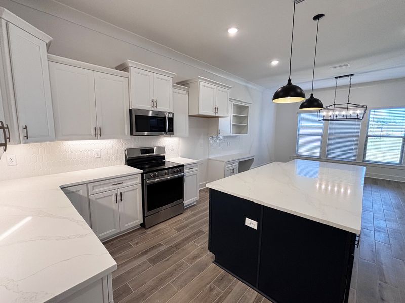 Furnished interior view inside a new home in Bird Song at Hammock Bay, Freeport (Image 7).