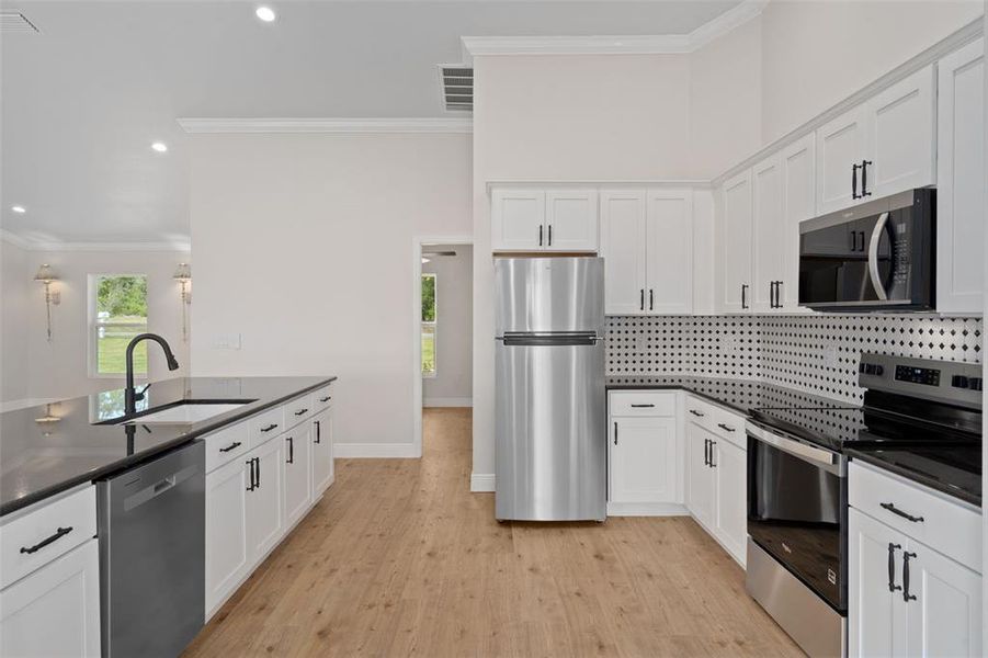 Furnished interior view inside a new home in , Weeki Wachee (Image 15).