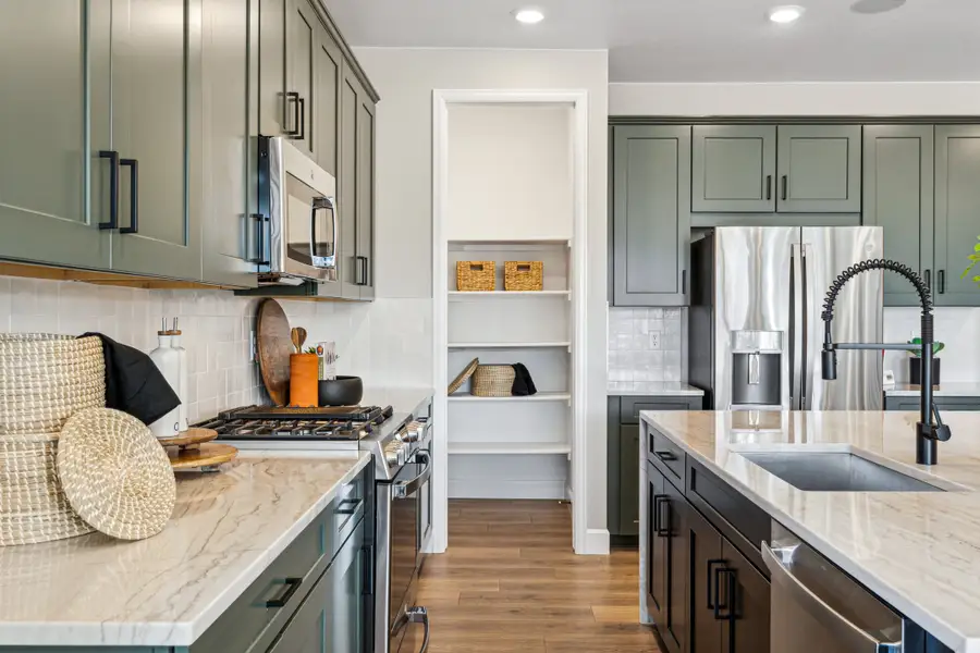 Furnished interior view inside a new home in Trailstone, Arvada (Image 14).