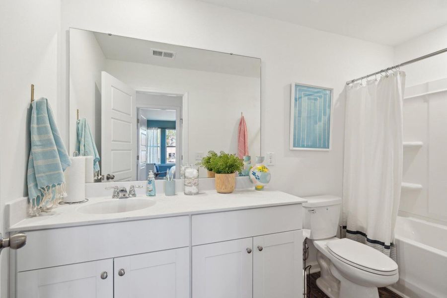 Furnished interior view inside a new home in Lindera Preserve at Cane Bay Plantation: Townhomes, Summerville (Image 5). Furnished interior view inside a new home in Lindera Preserve at Cane Bay Plantation: Townhomes, Summerville (Image 5).