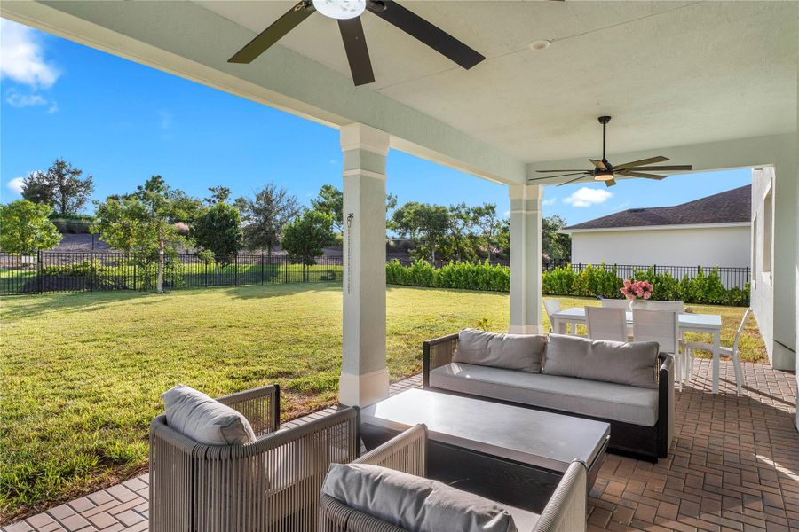 Exterior details and patio area of a home in Arden: The Waterford Collection, Loxahatchee (Image 2).